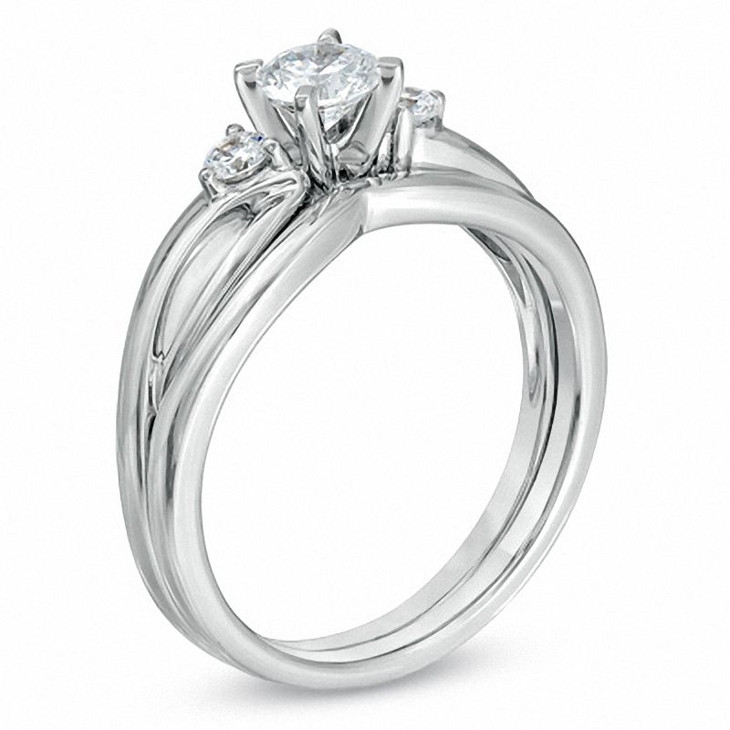 1/2 CT. T.W. Diamond Three Stone Split Shank Bridal Set in 14K White Gold (I/SI2)