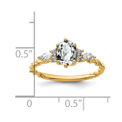 14K Yellow Gold Diamond and 7x5 Oval April/ Topaz Size 7 Twisted Ring