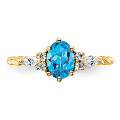 14K Yellow Gold Diamond and 7x5 Oval December/Blue Topaz Size 7 Twisted Ring