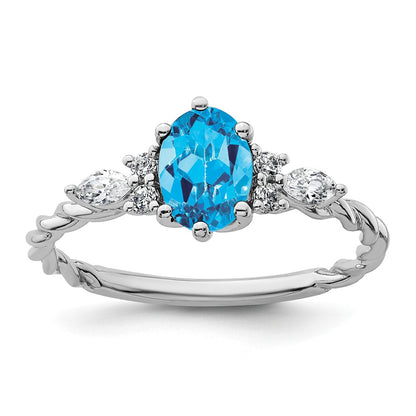 14K White Gold Diamond and 7x5 Oval December/Blue Topaz Size 7 Twisted Ring