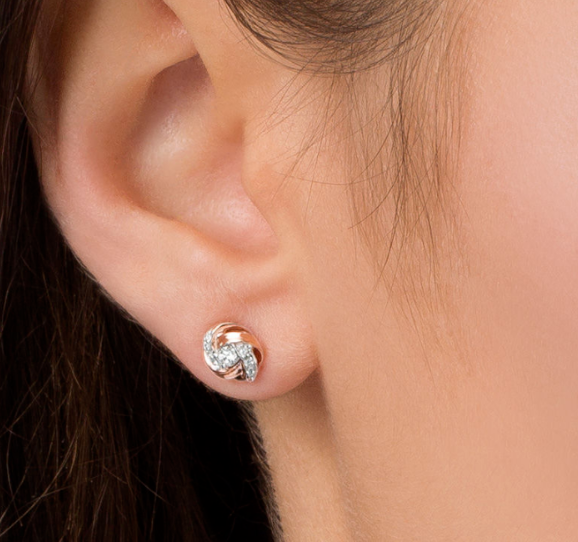 1/8 CT. T.W. Natural Diamond Love Knot Stud Earrings in 14K Rose Gold