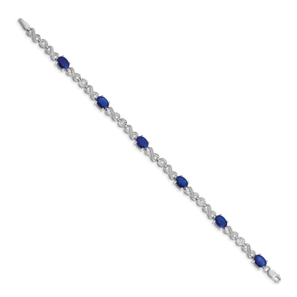 10K White Gold Diamond And Sapphire Infinity Bracelet