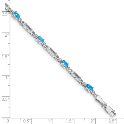 10K White Gold Diamond And Blue Topaz Bracelet