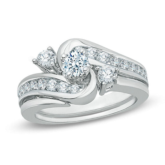 7/8 CT. T.W. Diamond Three Stone Slant Bypass Bridal Engagement Ring Set in 14K White Gold