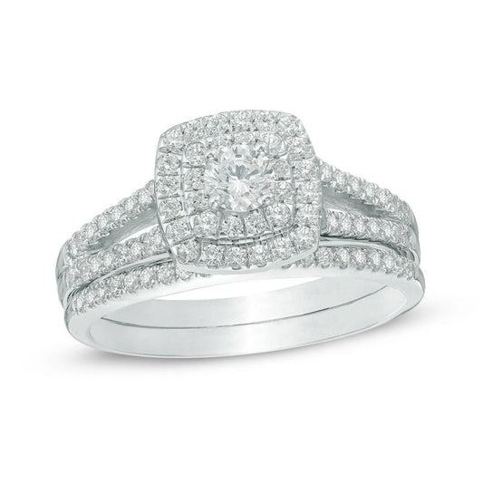 3/4 CT. T.W. Diamond Halo Split Shank Bridal Engagement Ring Set in 14K White Gold