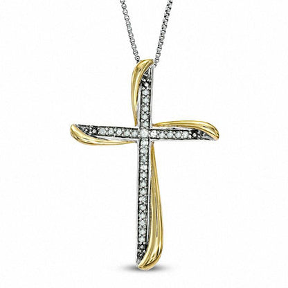 0.13 CT. T.W. Natural Diamond Twist Cross Pendant in Sterling Silver and 14K Gold Plate