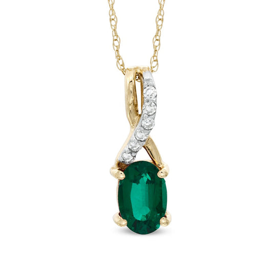 Oval Lab-Created Emerald and Diamond Accent Twist Pendant in 10K Yellow Gold