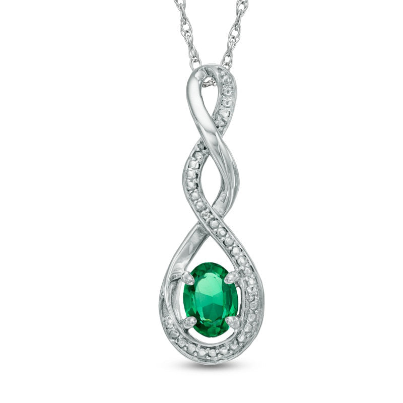 Oval Lab-Created Emerald and Diamond Accent Infinity Twist Pendant in Sterling Silver
