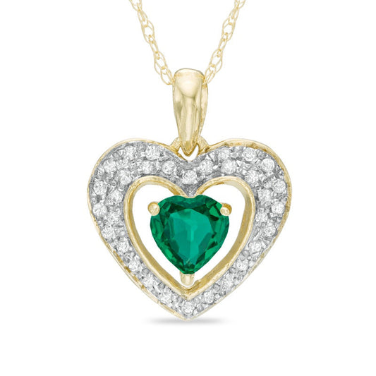 5.0mm Heart-Shaped Lab-Created Emerald and 0.13 CT. T.W. Diamond Frame Heart Pendant in 10K Yellow Gold