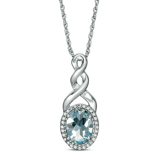 Oval Aquamarine and Natural Diamond Accent Frame Twist Pendant in Sterling Silver