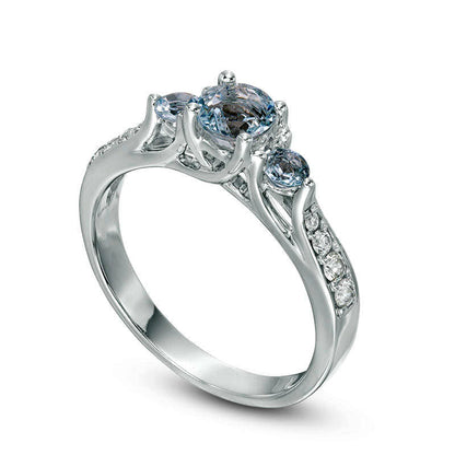 Aquamarine and 0.17 CT. T.W. Natural Diamond Three Stone Ring in Solid 10K White Gold