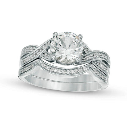 7.0mm Lab-Created White Sapphire and 0.17 CT. T.W. Diamond Twist Bridal Engagement Ring Set in Solid 10K White Gold