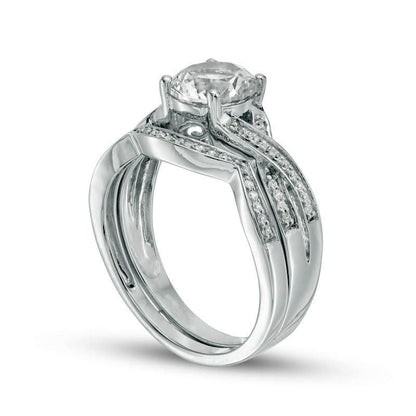 7.0mm Lab-Created White Sapphire and 0.17 CT. T.W. Diamond Twist Bridal Engagement Ring Set in Solid 10K White Gold