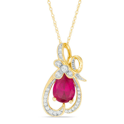 Pear-Shaped Lab-Created Ruby and 0.13 CT. T.W. Diamond Antique Vintage-Style Looping Ribbon Pendant in 10K Yellow Gold