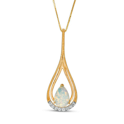 Pear-Shaped Lab-Created Opal and 0.07 CT. T.W. Diamond Double Frame Teardrop Pendant in 10K Yellow Gold