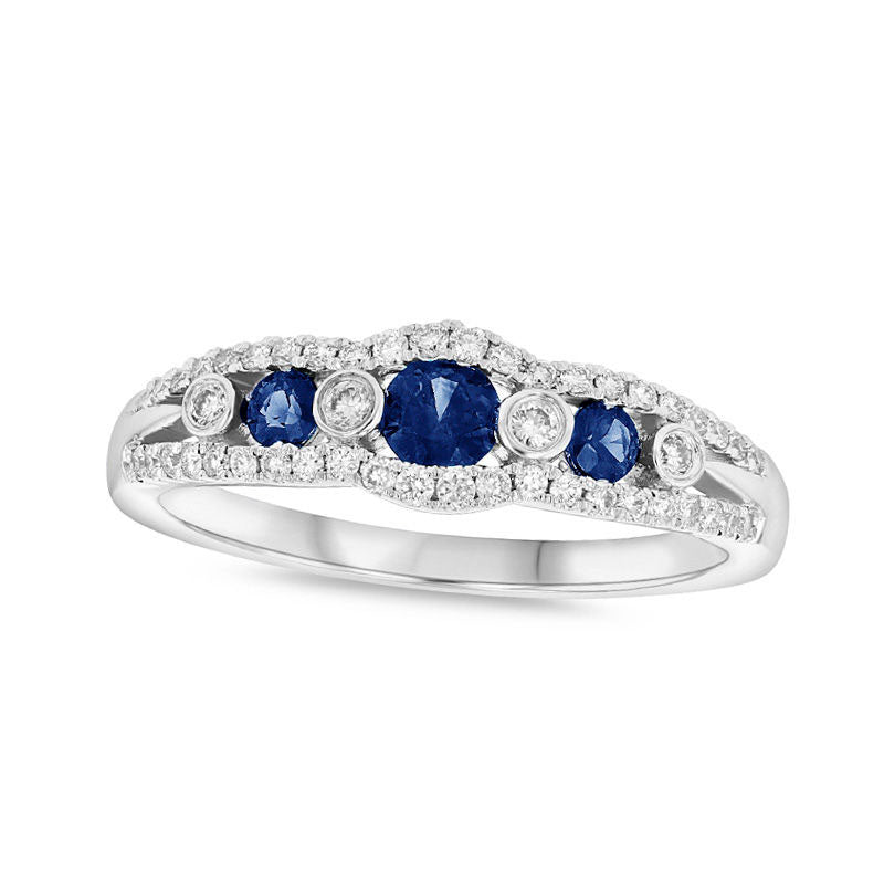 Blue Sapphire and 0.25 CT. T.W. Natural Diamond Seven Stone Anniversary Ring in Solid 14K White Gold