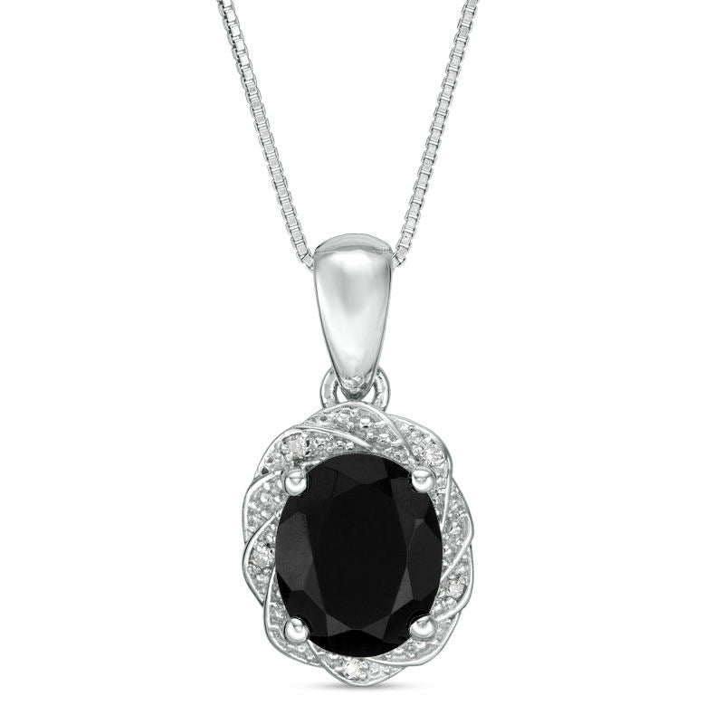 Oval Onyx and Natural Diamond Accent Pinwheel Frame Pendant in Sterling Silver