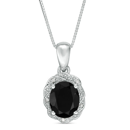 Oval Onyx and Natural Diamond Accent Pinwheel Frame Pendant in Sterling Silver