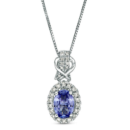 Oval Tanzanite and 0.17 CT. T.W. Natural Diamond Frame Overlay Pendant in 10K White Gold