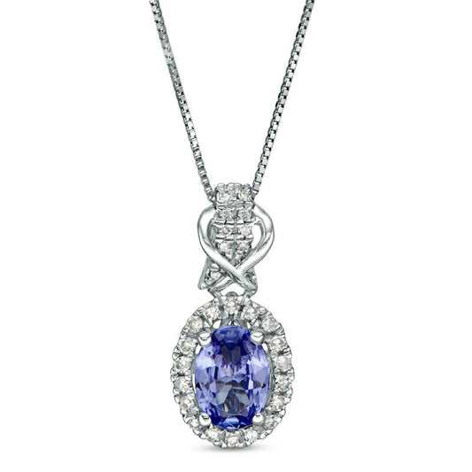 Oval Tanzanite and 0.17 CT. T.W. Natural Diamond Frame Overlay Pendant in 10K White Gold