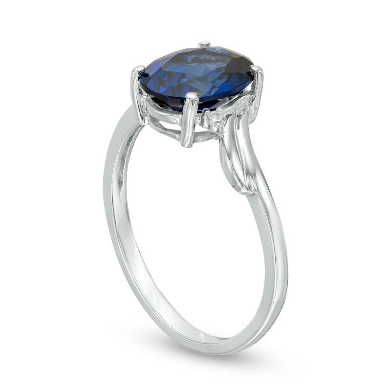 Oval Lab-Created Blue Sapphire and Diamond Accent Bypass Swirl Shank Ring in Solid 10K White Gold