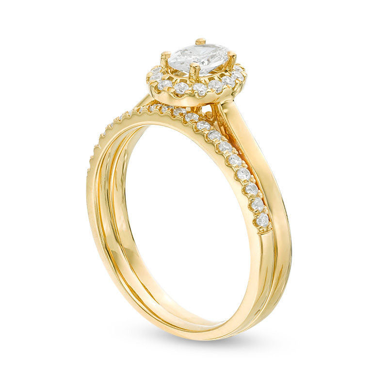 0.75 CT. T.W. Oval Natural Diamond Frame Bridal Engagement Ring Set in Solid 14K Gold