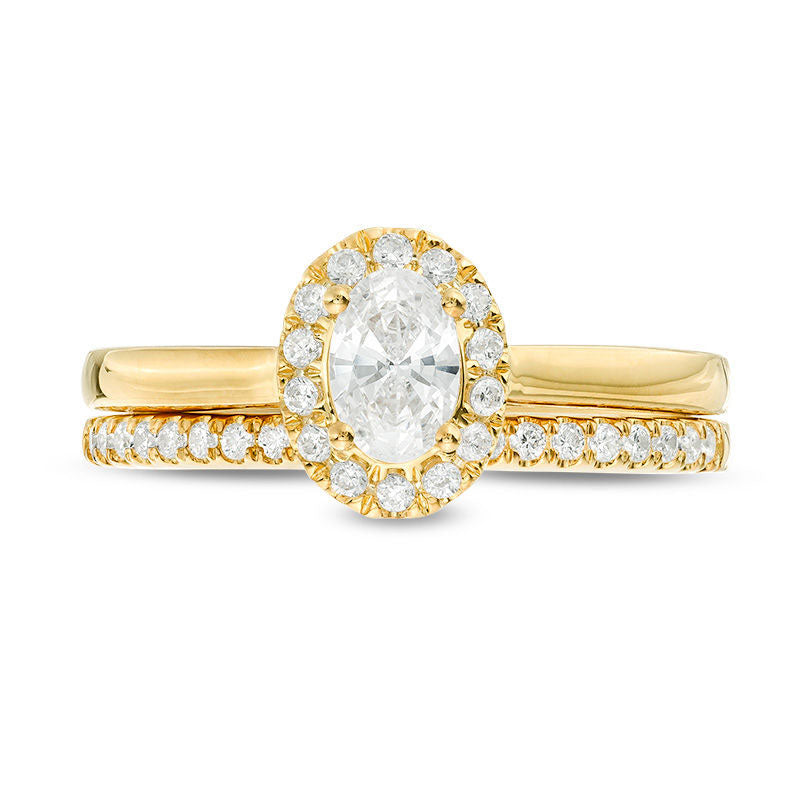 0.75 CT. T.W. Oval Natural Diamond Frame Bridal Engagement Ring Set in Solid 14K Gold