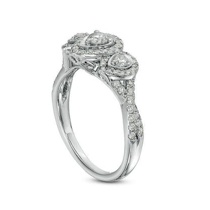 0.75 CT. T.W. Natural Diamond Three Stone Pear-Shaped Frame Twist Engagement Ring in Solid 10K White Gold