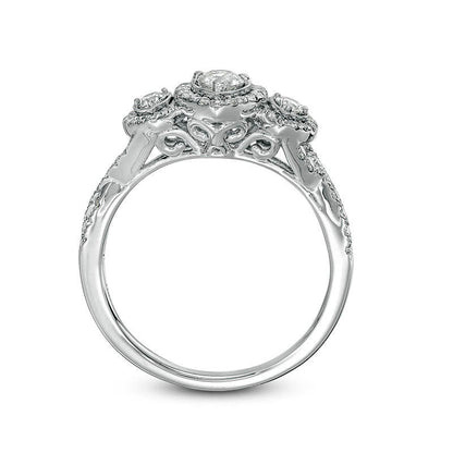 0.75 CT. T.W. Natural Diamond Three Stone Pear-Shaped Frame Twist Engagement Ring in Solid 10K White Gold
