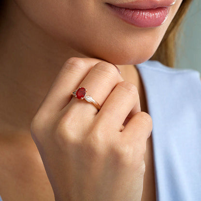 Oval Fire Opal and Natural Diamond Accent Infinity Knot Ring in Solid 10K Rose Gold