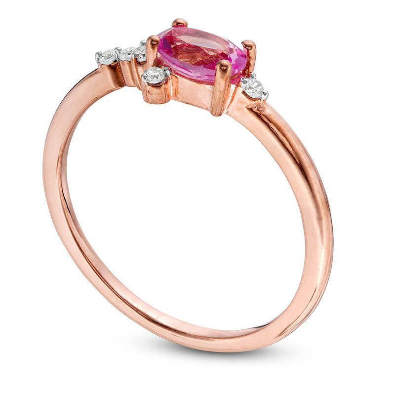 Oval Lab-Created Pink Sapphire and 0.07 CT. T.W. Diamond Side Accent Promise Ring in Solid 10K Rose Gold