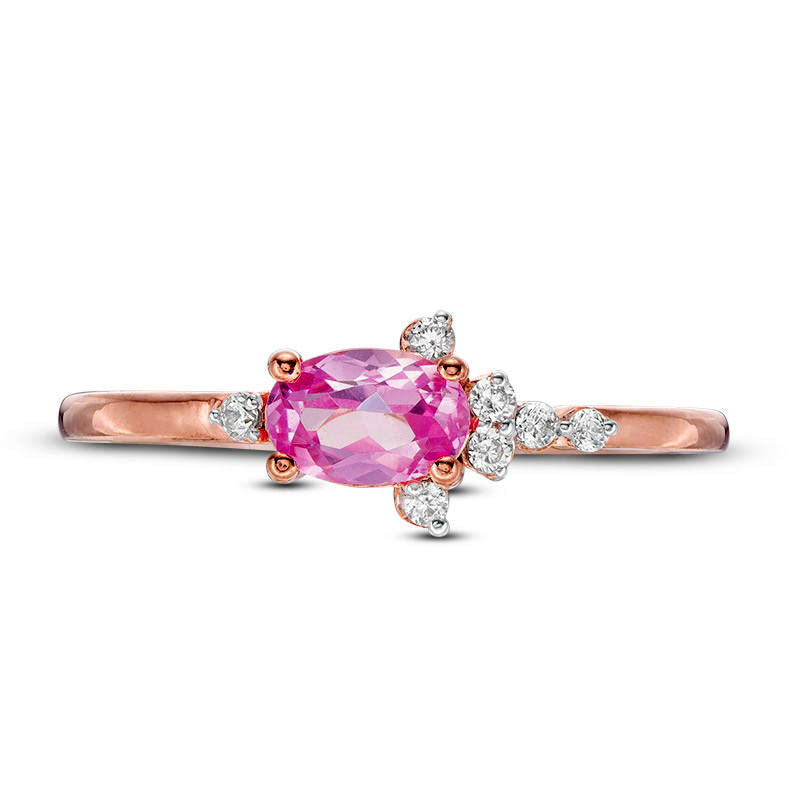 Oval Lab-Created Pink Sapphire and 0.07 CT. T.W. Diamond Side Accent Promise Ring in Solid 10K Rose Gold