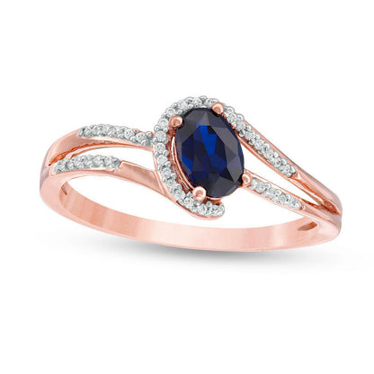 Oval Lab-Created Blue Sapphire and 0.07 CT. T.W. Diamond Swirling Bypass Split Shank Promise Ring in Solid 10K Rose Gold