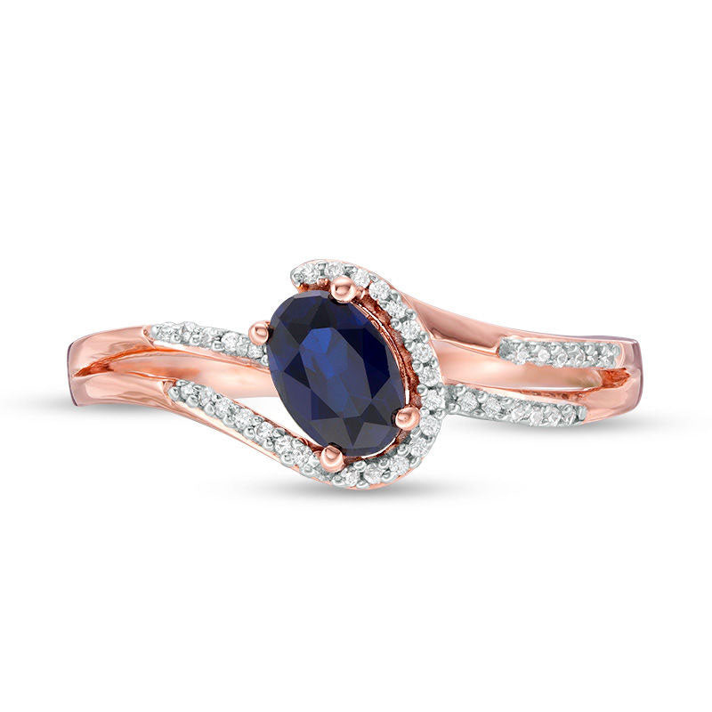 Oval Lab-Created Blue Sapphire and 0.07 CT. T.W. Diamond Swirling Bypass Split Shank Promise Ring in Solid 10K Rose Gold