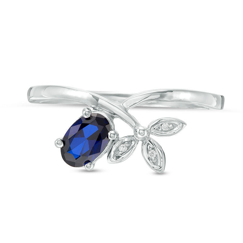 Oval Lab-Created Blue Sapphire and Diamond Accent Tri-Leaf Crossover Promise Ring in Sterling Silver