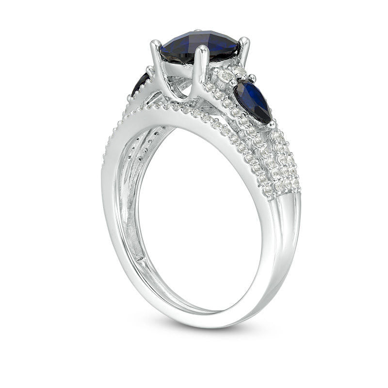 Oval Lab-Created Blue Sapphire and 0.50 CT. T.W. Diamond Three Stone Ring in Solid 10K White Gold