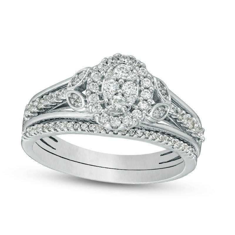 0.50 CT. T.W. Oval Composite Natural Diamond Leaf-Sides Bridal Engagement Ring Set in Sterling Silver