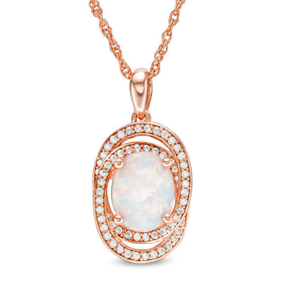 Oval Opal and 0.25 CT. T.W. Natural Diamond Orbit Frame Pendant in 10K Rose Gold