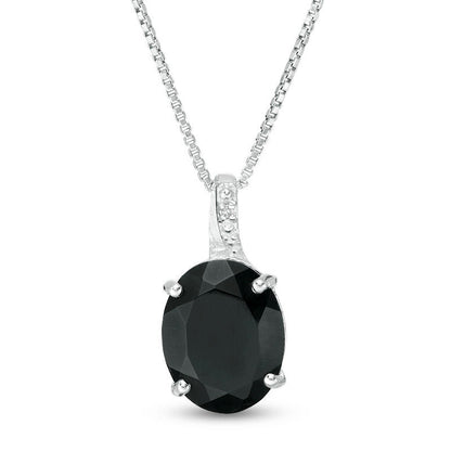 Oval Onyx and Natural Diamond Accent Pendant in Sterling Silver