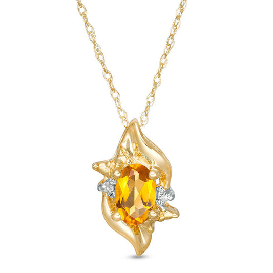 Oval Citrine and Natural Diamond Accent Flame Burst Pendant in 10K Yellow Gold