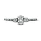 0.63 CT. T.W. Oval and Round Natural Diamond Three Stone Engagement Ring in Solid 14K White Gold