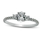 0.88 CT. T.W. Oval and Round Natural Diamond Three Stone Engagement Ring in Solid 14K White Gold