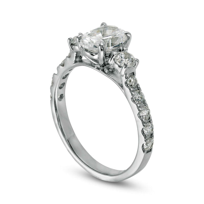 1.75 CT. T.W. Oval and Round Natural Diamond Three Stone Engagement Ring in Solid 14K White Gold