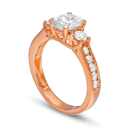 1.75 CT. T.W. Oval and Round Natural Diamond Three Stone Engagement Ring in Solid 14K Rose Gold