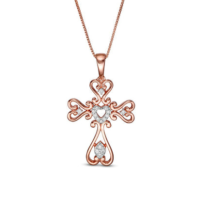 0.13 CT. T.W. Natural Diamond Heart-Shaped Cross Pendant in Sterling Silver with 14K Rose Gold Plate