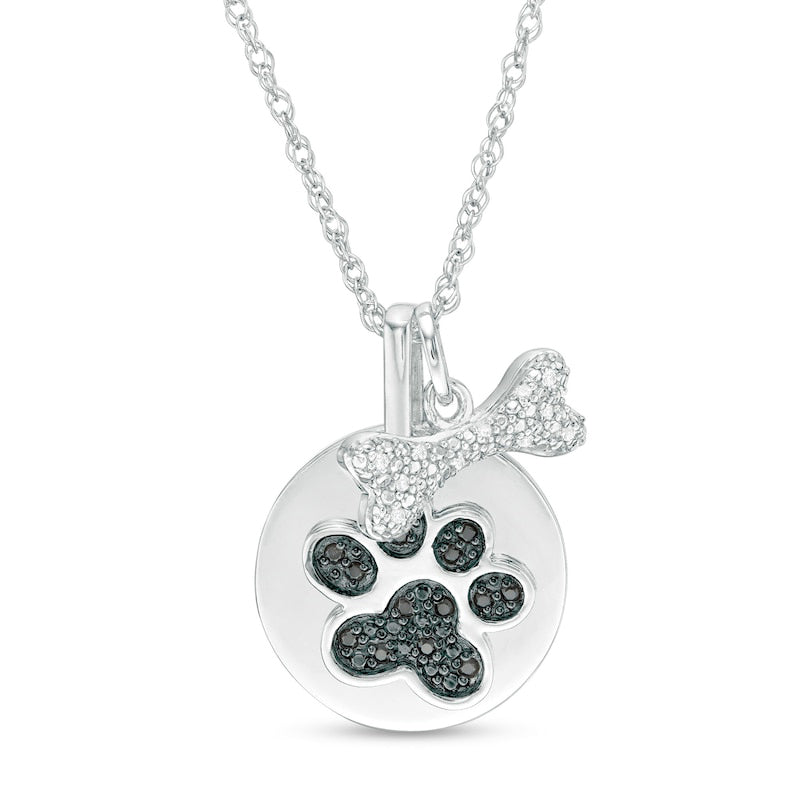 0.1 CT. T.W. Enhanced Black and White Natural Diamond Bone and Paw Print Disc Charm Pendant in Sterling Silver