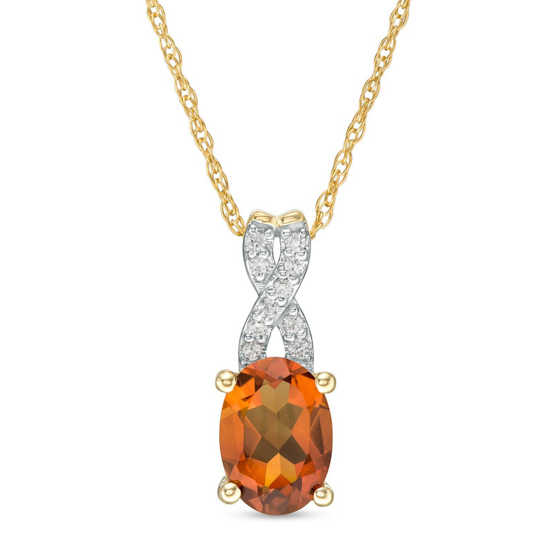 Oval Madeira Citrine and 0.05 CT. T.W. Natural Diamond X" Drop Pendant in 10K Yellow Gold"