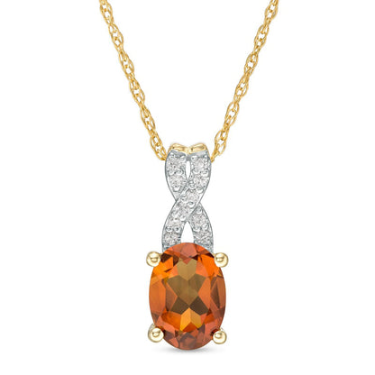 Oval Madeira Citrine and 0.05 CT. T.W. Natural Diamond X" Drop Pendant in 10K Yellow Gold"