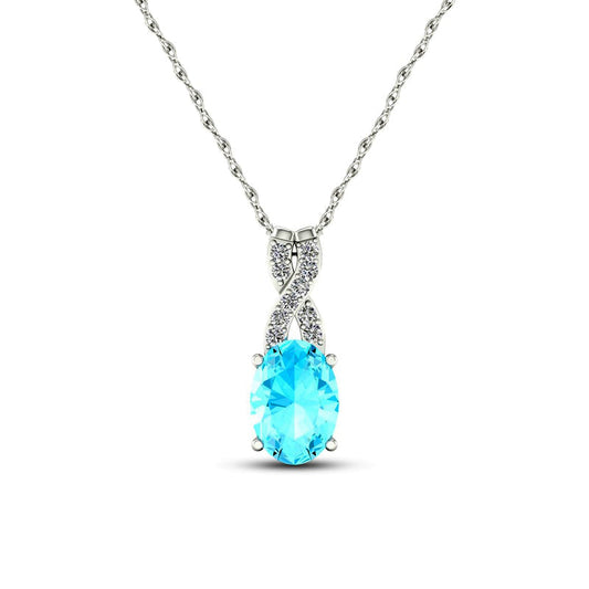 Oval Aquamarine and 0.05 CT. T.W. Natural Diamond X" Drop Pendant in 10K White Gold"