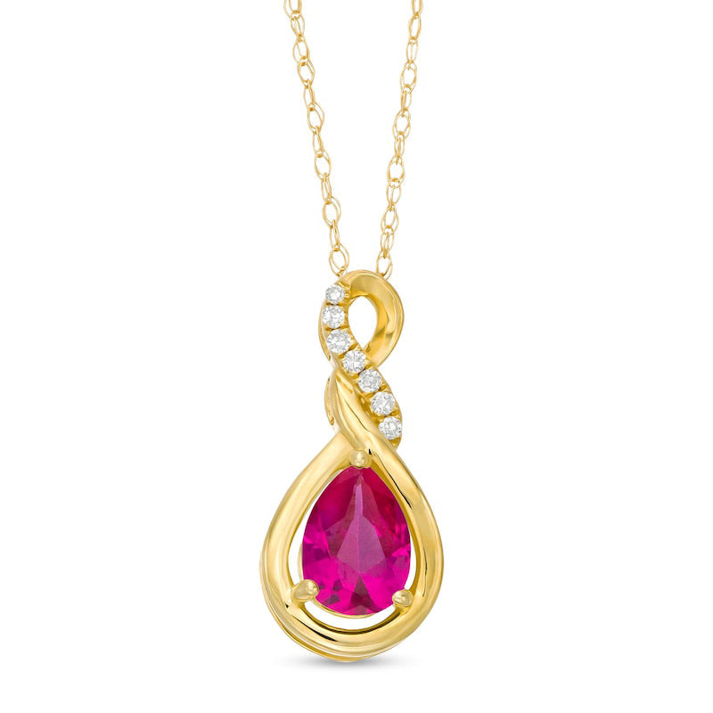 Pear-Shaped Lab-Created Ruby and Diamond Accent Cascading Teardrop Pendant in 10K Yellow Gold